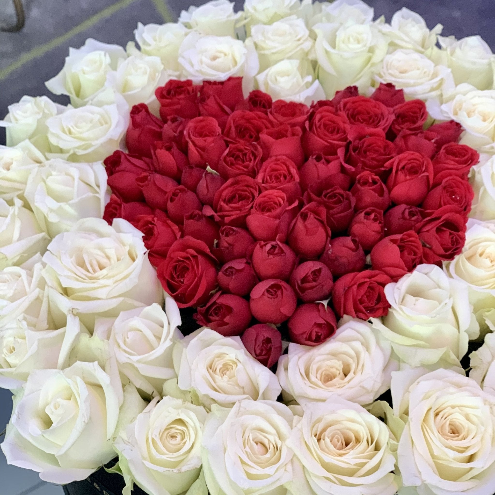 Heart in heart arrangement in a luxury round box - Upscale and Posh - Same Day Flower Delivery Dubai