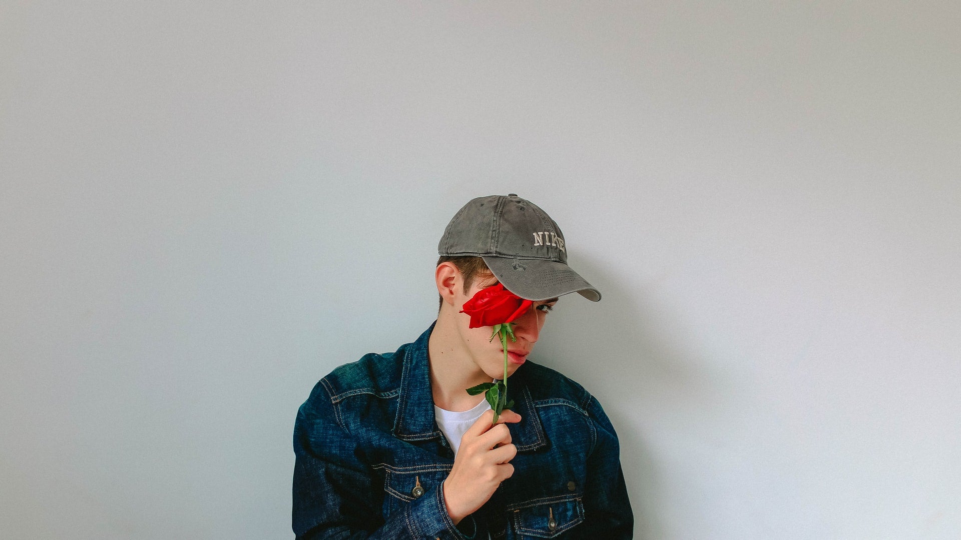 man holding a rose