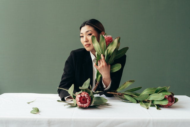 woman holding flowers