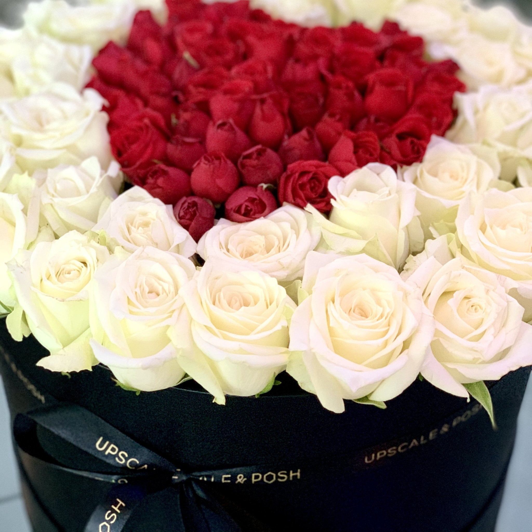 Heart in heart arrangement in a luxury round box - Upscale and Posh - Same Day Flower Delivery Dubai